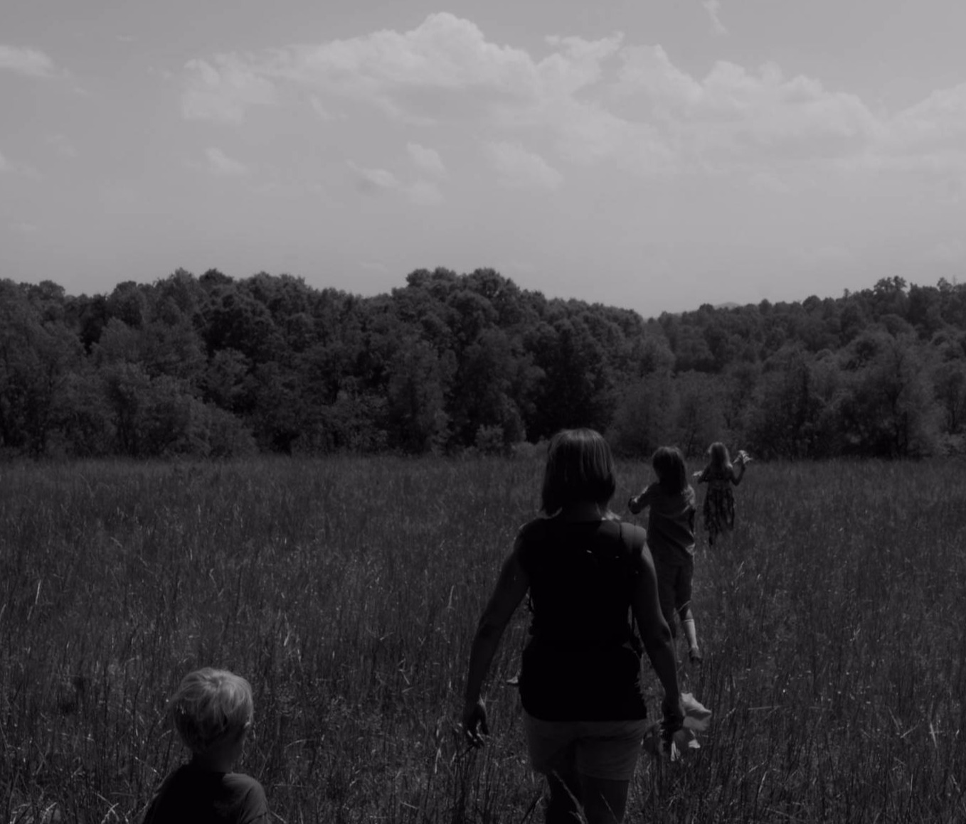 BHR farm family hikes on a high meadow near the Blue Ridge Mountains